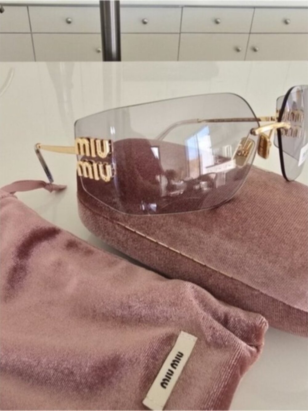 NWT   Miu Miu Women's Sunglasses Light Gray/gold